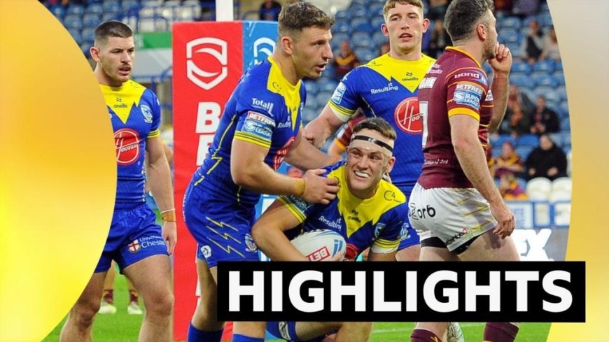 Ashton scores hat-trick as Wire hammer Huddersfield